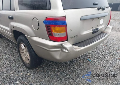 2004 Jeep Grand Cherokee Laredo z USA, uszkodzony, nr VIN 1J4GX48S14C187657